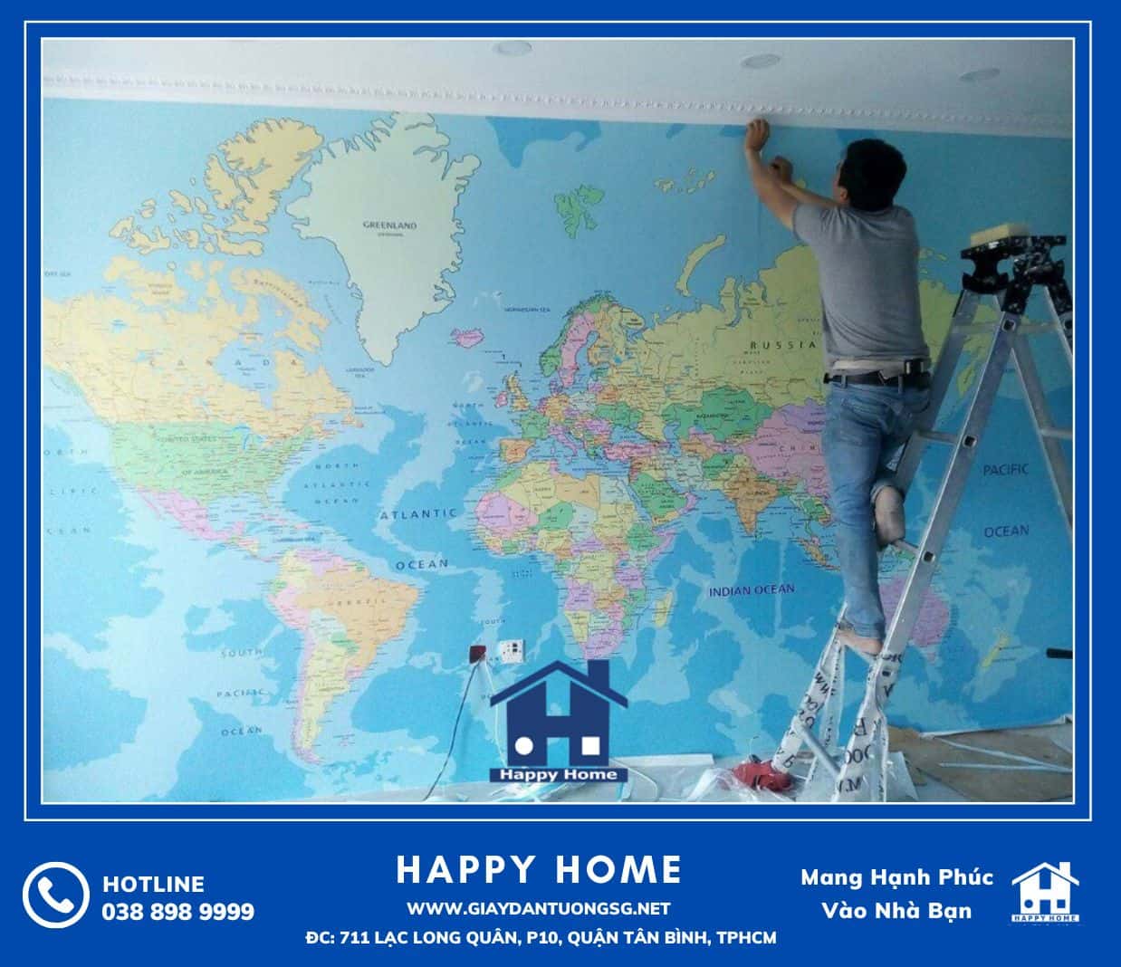 Đội ngũ Happy Home thi công tranh dán tường bản đồ tại căn hộ khách hàng
