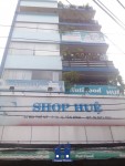 thi công giấy dán tường cho shop huệ